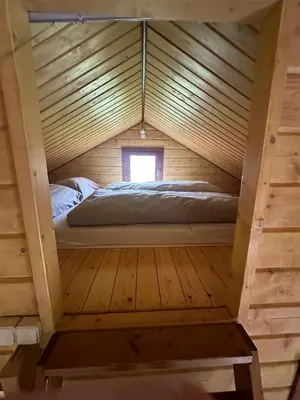 Ein Bett oder Betten in einem Zimmer der Unterkunft Bungalow am Hafen