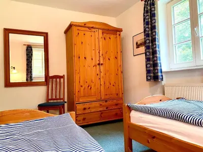 Ein Bett oder Betten in einem Zimmer der Unterkunft Achtern Diek Haus 8 Wohnung 3