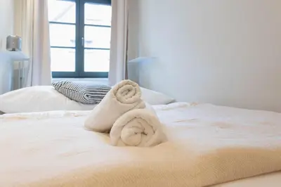 Ein Bett oder Betten in einem Zimmer der Unterkunft Ferienwohnung Baltic