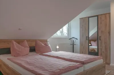 Ein Bett oder Betten in einem Zimmer der Unterkunft Ferienwohnung Ostsee