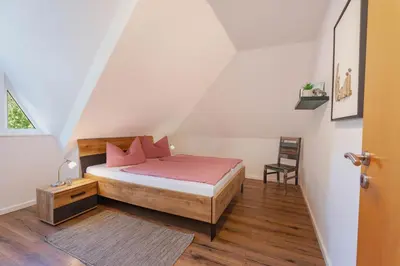 Ein Bett oder Betten in einem Zimmer der Unterkunft Ferienwohnung Strand