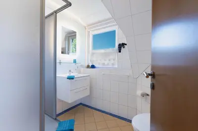 Ein Badezimmer in der Unterkunft Ferienwohnung Strand