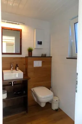 Ein Badezimmer in der Unterkunft Ostsee Tiny Haus Wachtel