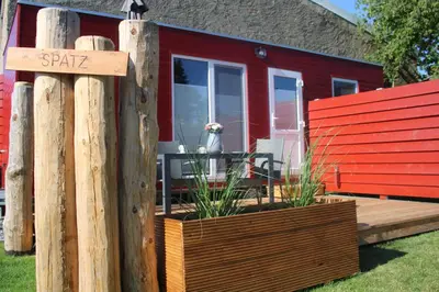 Ein Garten an der Unterkunft Ostsee Tiny Haus Spatz