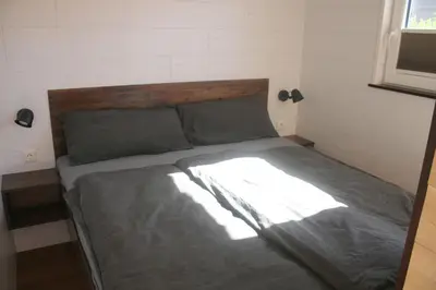 Ein Bett oder Betten in einem Zimmer der Unterkunft Ostsee Tiny Haus Spatz