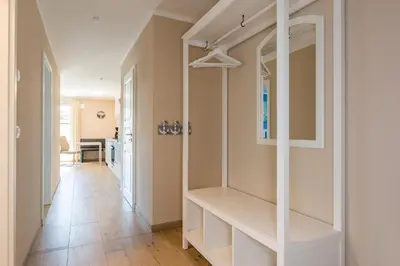 Ein Badezimmer in der Unterkunft HMuschelsucher, Birkenstraße 7a, App 1