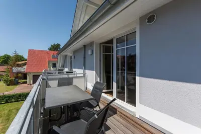 Ein Balkon oder eine Terrasse in der Unterkunft HMuschelsucher, Birkenstraße 7a, App 4