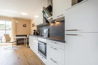 Küche/Küchenzeile in der Unterkunft HMuschelsucher, Birkenstraße 7a, App 4