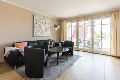 Ein Sitzbereich in der Unterkunft HMuschelsucher, Birkenstraße 7a, App 6