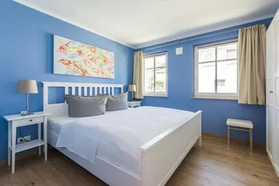 Ein Bett oder Betten in einem Zimmer der Unterkunft HMuschelsucher, Birkenstraße 7a, App 6