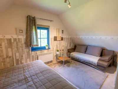 Ein Bett oder Betten in einem Zimmer der Unterkunft Ferienhaus Tüdelnest