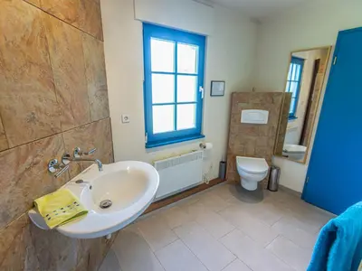 Ein Badezimmer in der Unterkunft Ferienhaus Tüdelnest
