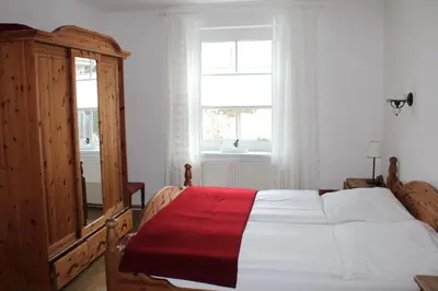 Ein Bett oder Betten in einem Zimmer der Unterkunft Zwischen Meer und Bodden App 03