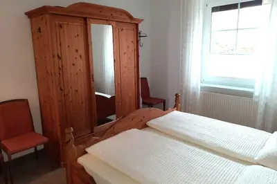Ein Bett oder Betten in einem Zimmer der Unterkunft Zwischen Meer und Bodden App 02