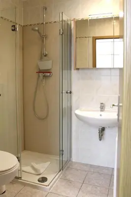 Ein Badezimmer in der Unterkunft Zwischen Meer und Bodden App 01