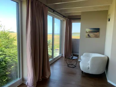 Ein Sitzbereich in der Unterkunft Panorama-Haus Boddenperle