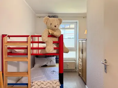 Ein Bett oder Betten in einem Zimmer der Unterkunft Lütte Auszeit