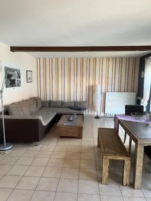Ein Sitzbereich in der Unterkunft Haus Brekersmeden