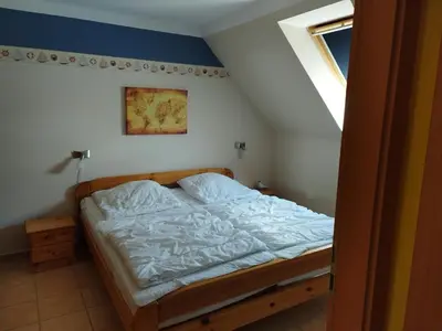 Ein Bett oder Betten in einem Zimmer der Unterkunft Zur Wellenwiese 24