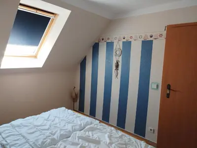 Ein Bett oder Betten in einem Zimmer der Unterkunft Zur Wellenwiese 24
