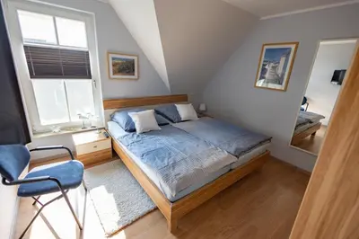 Ein Bett oder Betten in einem Zimmer der Unterkunft Ostseetraum, Whg 4