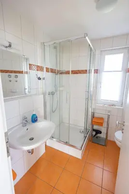 Ein Badezimmer in der Unterkunft Ostseetraum, Whg 4
