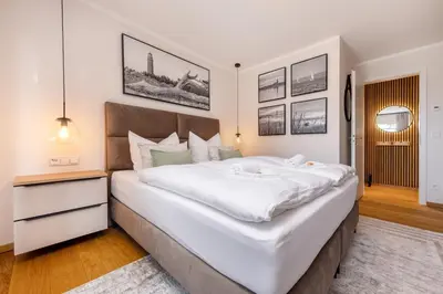 Ein Bett oder Betten in einem Zimmer der Unterkunft Strandvilla Zingst- AP 16