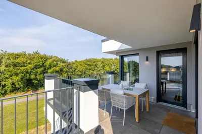 Ein Balkon oder eine Terrasse in der Unterkunft Strandvilla Zingst- AP 16