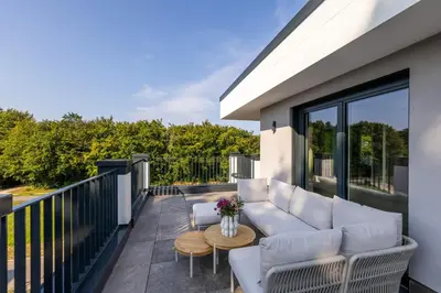 Ein Balkon oder eine Terrasse in der Unterkunft Strandvilla Zingst- AP 16
