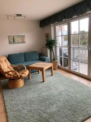 Ein Sitzbereich in der Unterkunft Ferienwohnung 1 Strandstraße 55