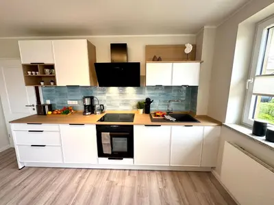 Küche/Küchenzeile in der Unterkunft BIRKENHOF Haus 08, App 45