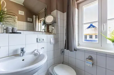 Ein Badezimmer in der Unterkunft Meerzeit