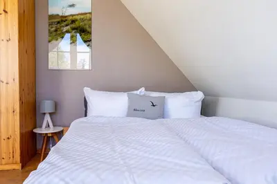 Ein Bett oder Betten in einem Zimmer der Unterkunft Meerzeit