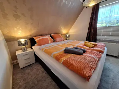 Ein Bett oder Betten in einem Zimmer der Unterkunft Karina I