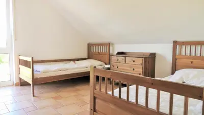 Ein Bett oder Betten in einem Zimmer der Unterkunft FeWo Klaus Störtebeker