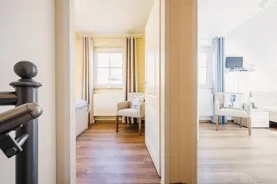 Ein Bett oder Betten in einem Zimmer der Unterkunft Am Deich 31 Haus Sommerliebe