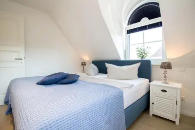 Ein Bett oder Betten in einem Zimmer der Unterkunft Glebbe 58 