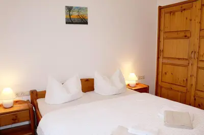 Ein Bett oder Betten in einem Zimmer der Unterkunft Haus Kleist Wohnung 1 (rechts)