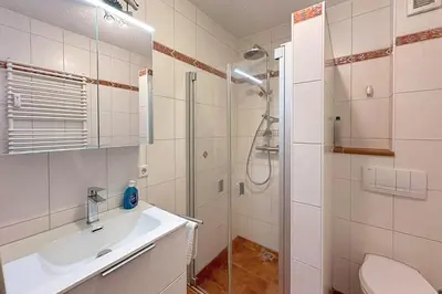 Ein Badezimmer in der Unterkunft W2 HzL