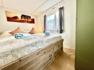 Ein Bett oder Betten in einem Zimmer der Unterkunft tiny house an der Pferdekoppel