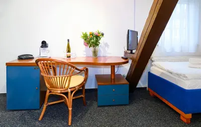 Ein Bett oder Betten in einem Zimmer der Unterkunft Vinetahotel Stadt Barth
