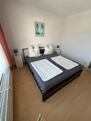 Ein Bett oder Betten in einem Zimmer der Unterkunft Likeedeler Weg 1, Haus Böde, Whg 20