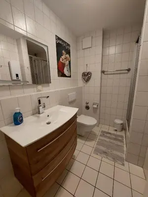 Ein Badezimmer in der Unterkunft Birkenquartier