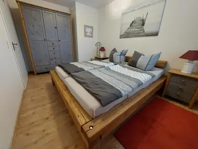 Ein Bett oder Betten in einem Zimmer der Unterkunft Birkenquartier