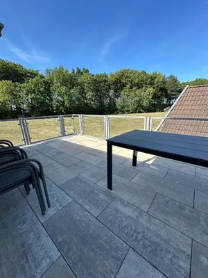 Ein Balkon oder eine Terrasse in der Unterkunft Villa Dünenblick 05