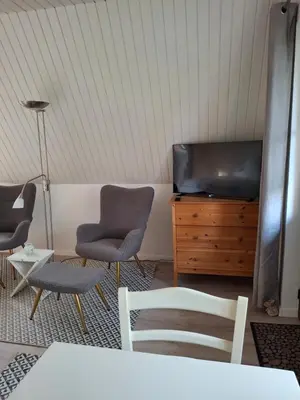 Ein Sitzbereich in der Unterkunft Ferienwohnung am Badesteig