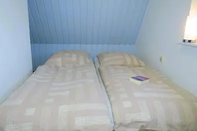 Ein Bett oder Betten in einem Zimmer der Unterkunft Ferienhaus Prerow