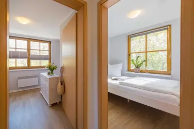 Ein Bett oder Betten in einem Zimmer der Unterkunft Ferienhaus Dierhagen am Deich