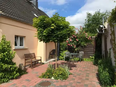 Ein Garten an der Unterkunft Ferienhaus in Bartelshagen II
