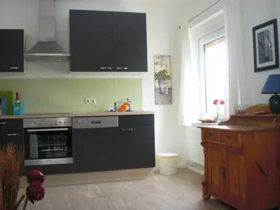 Küche/Küchenzeile in der Unterkunft Ferienhaus in Bartelshagen II